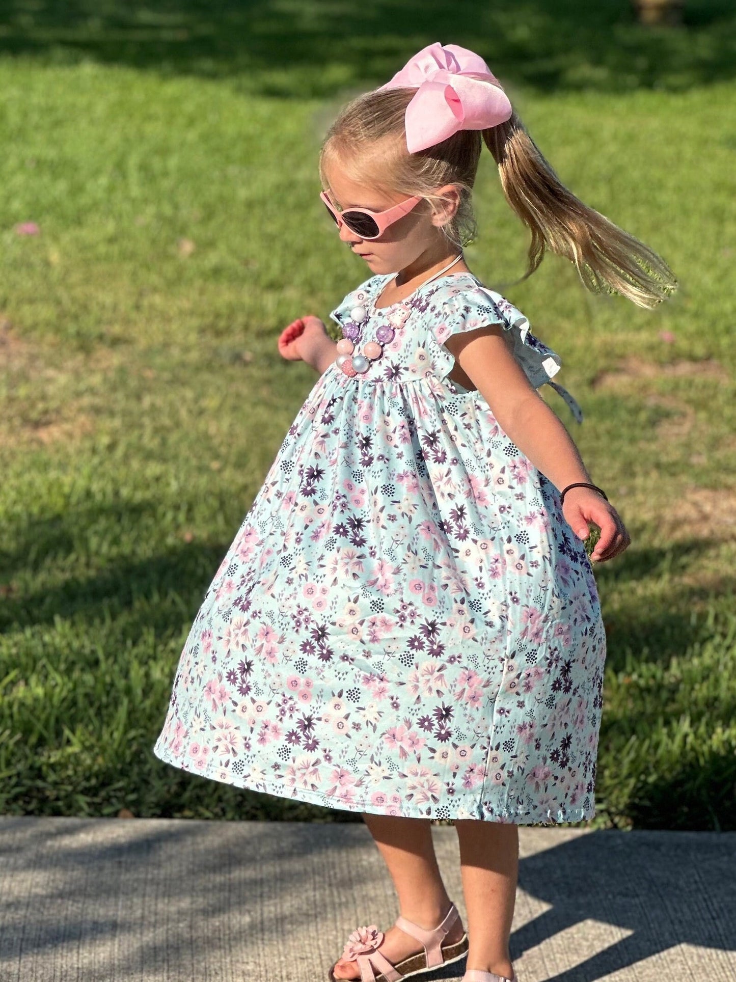 Blue Floral tie back flow dress