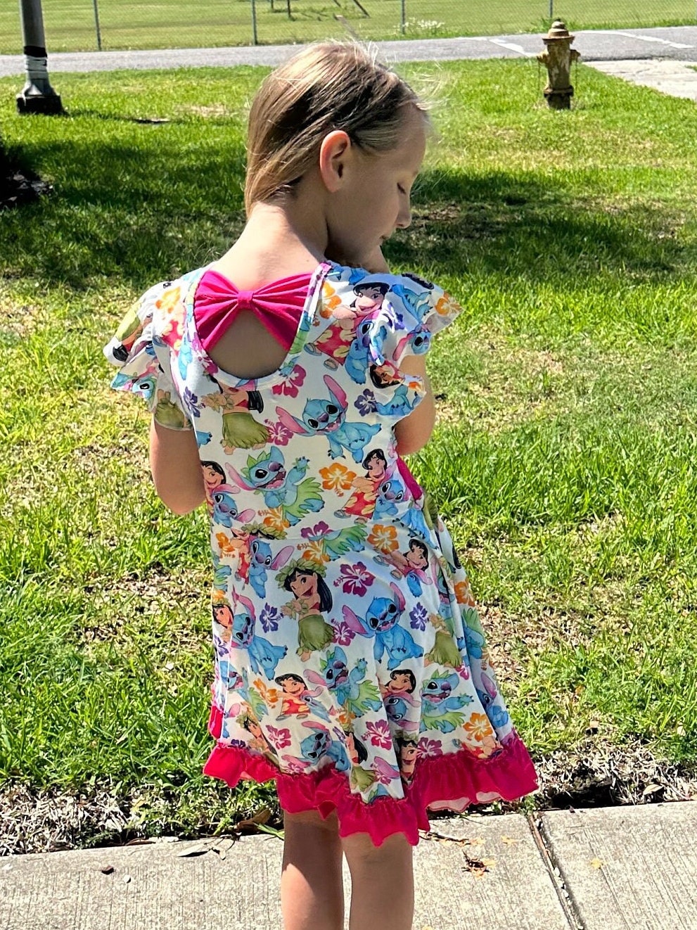 Blue Alien bow back twirl dress with flowers