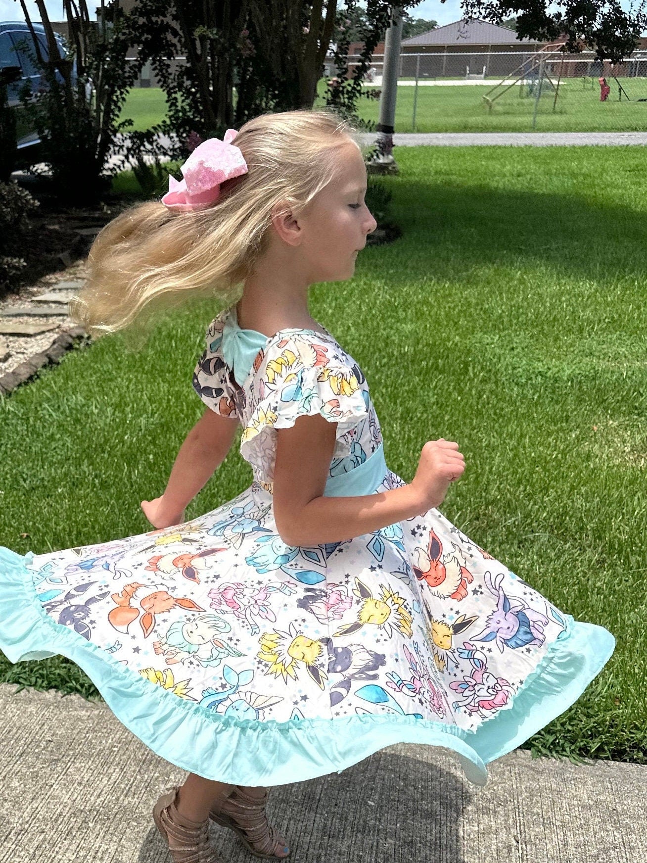 Teal Pocket Characters Twirl Dress