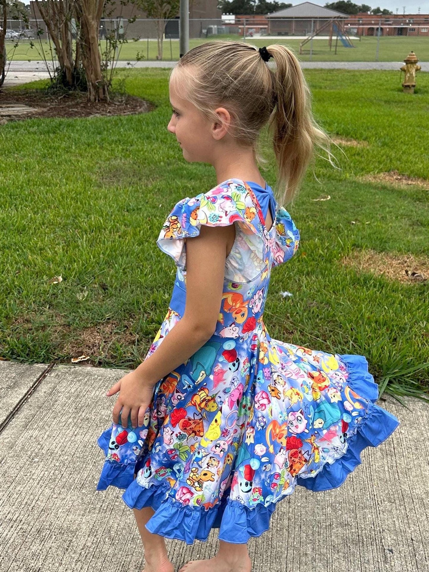 Blue Bow Back Pocket Characters Twirl Dress