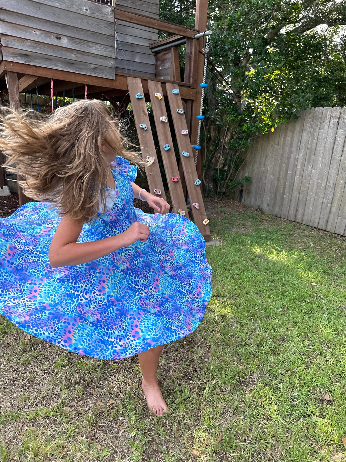 Blue Cheetah crossback flutter twirl dress