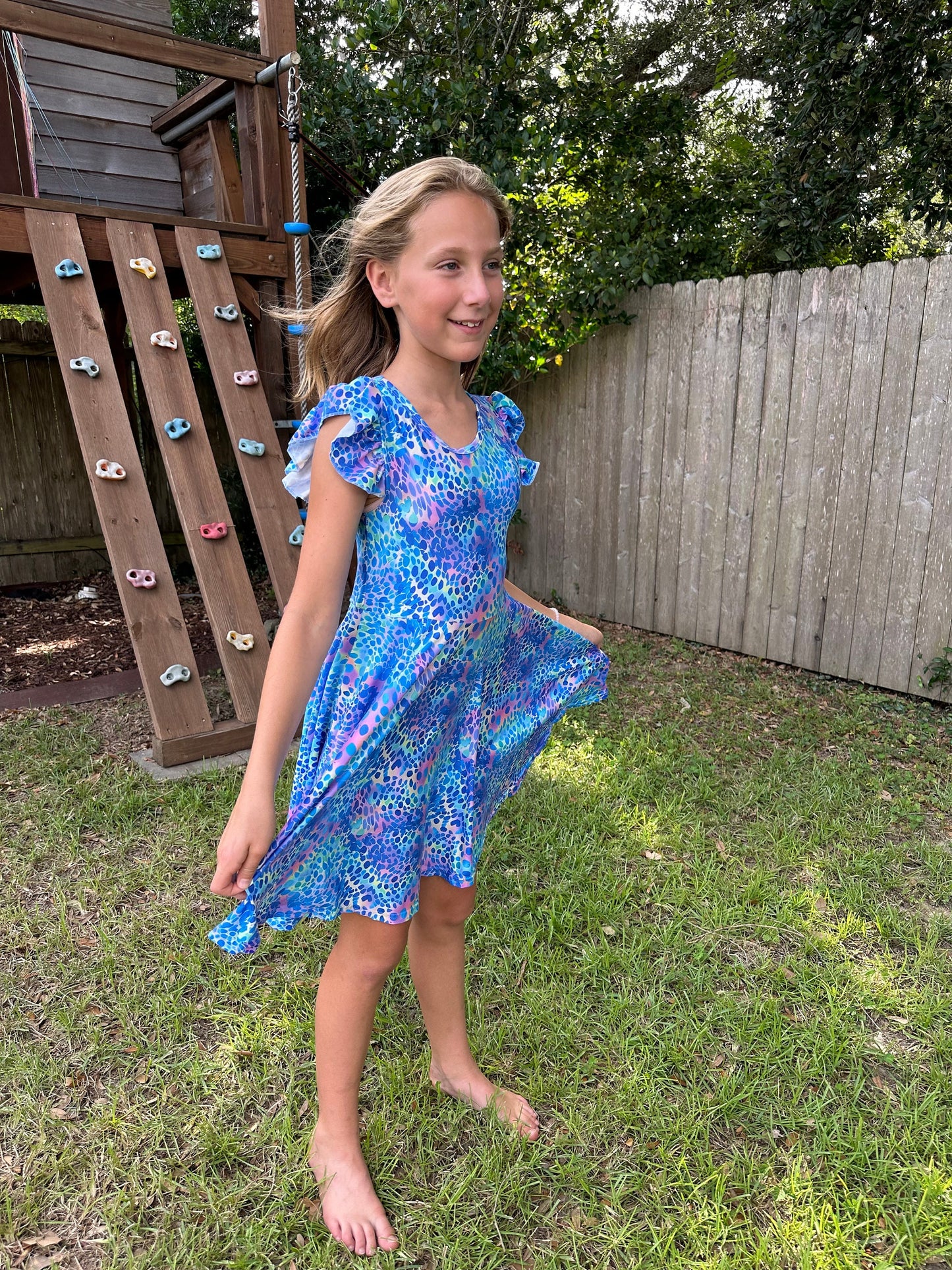 Blue Cheetah crossback flutter twirl dress