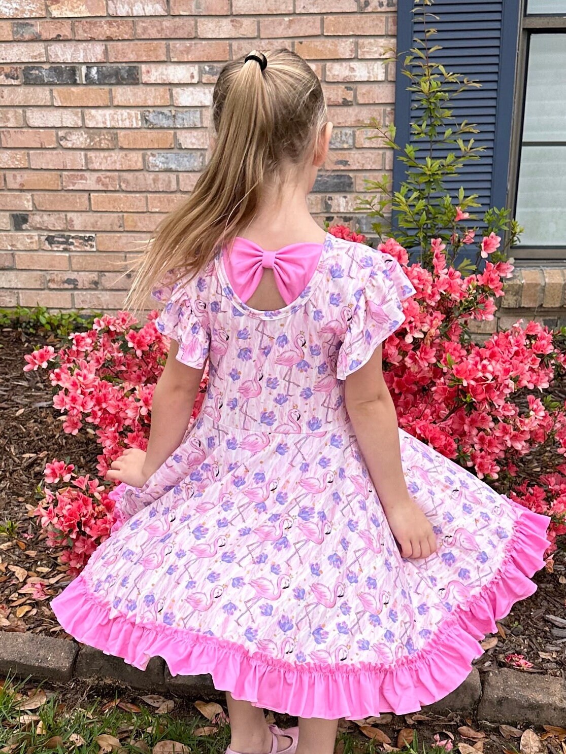 flamingo floral bow back twirl dress