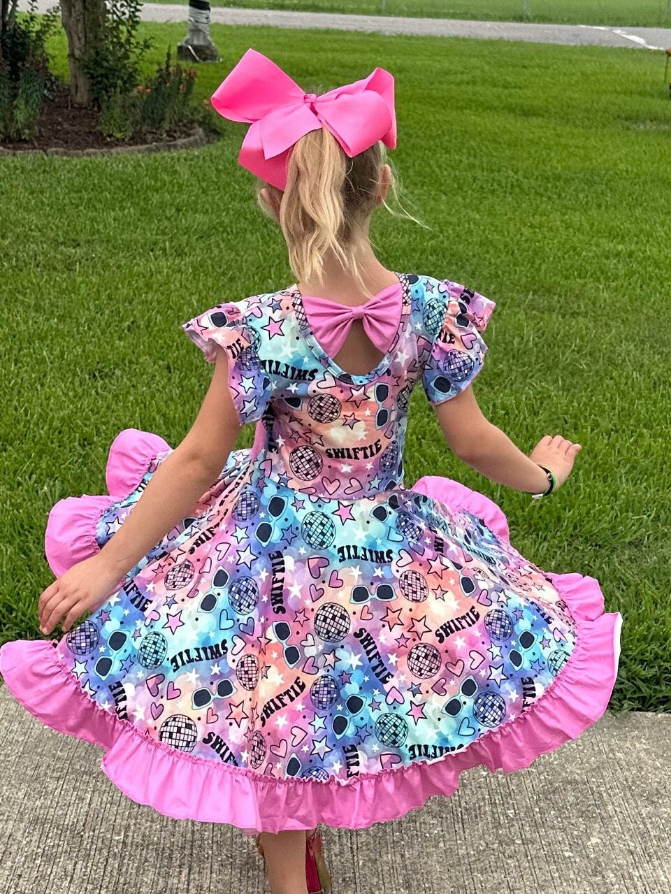 Singer Rainbow Bow Back Twirl Dress