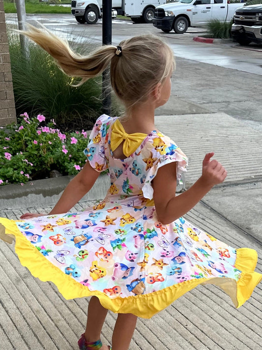 Pocket Characters Bow Back Twirl Dress With Shorts