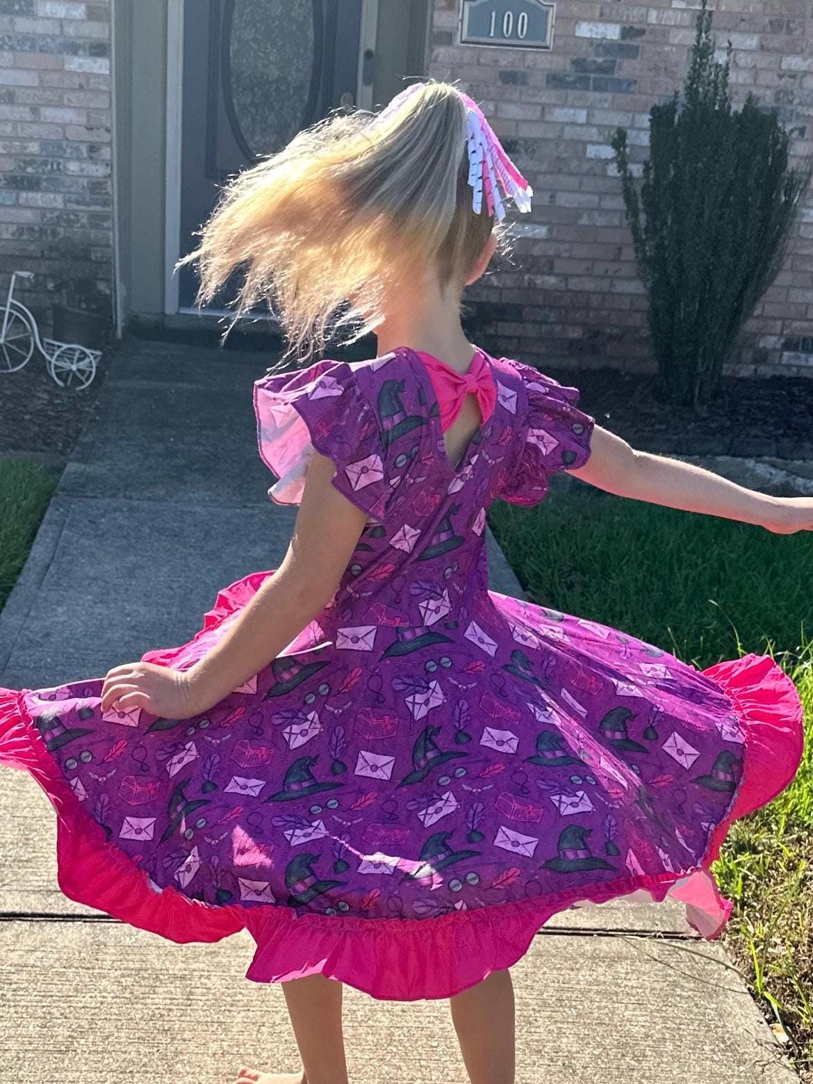 Wizard and Things Bow Back Twirl Dress